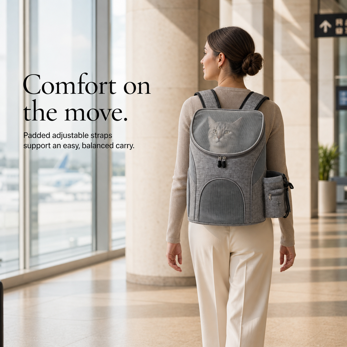 Woman wearing grey cat carrier backpack with padded adjustable straps