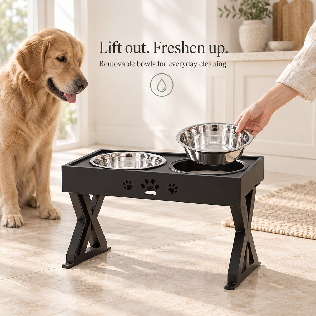 Removable steel bowl lifted from feeding station