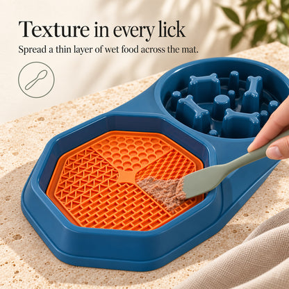 Orange textured licking mat with a thin layer of wet food